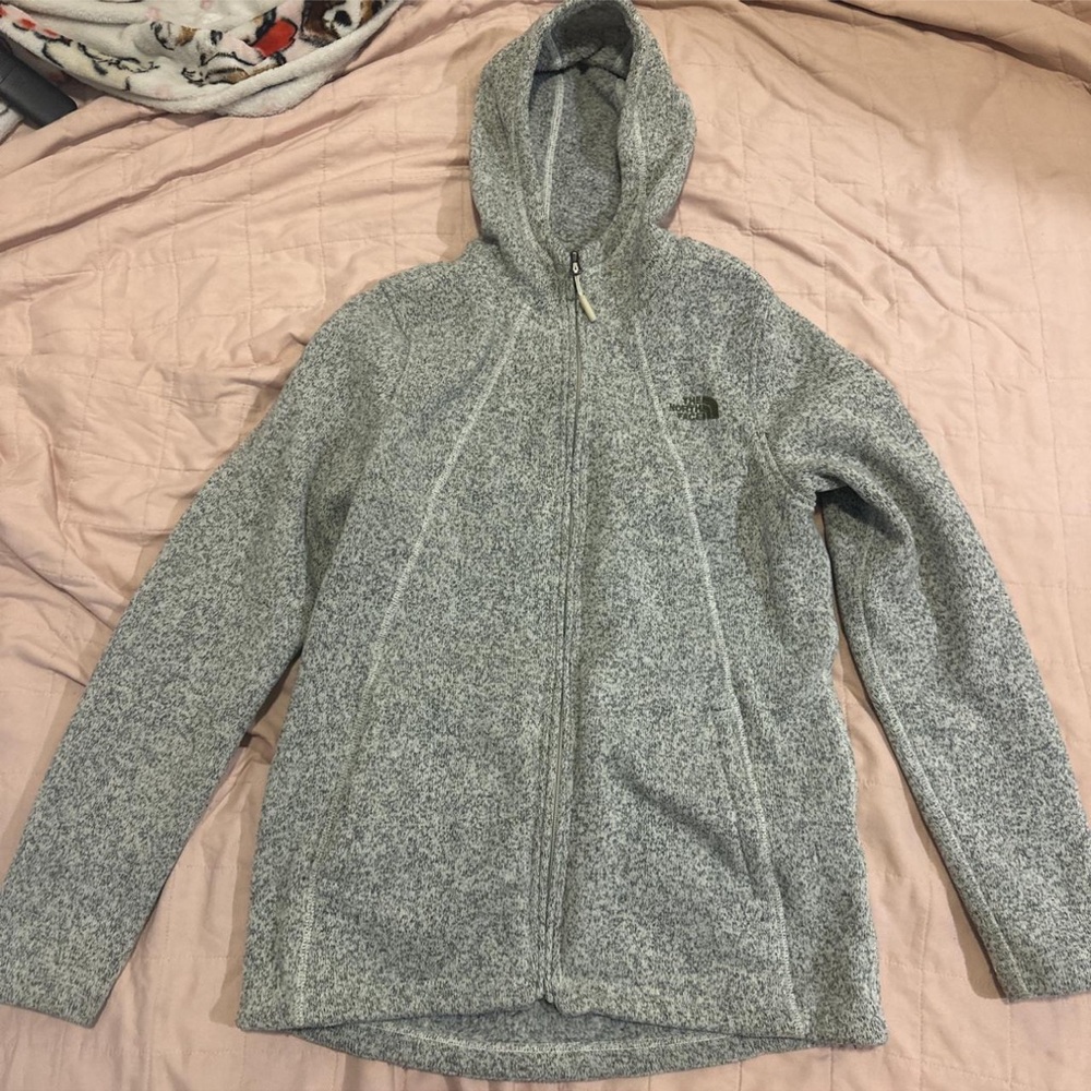 Woman’s north face grey zip up sweater